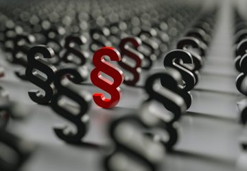 red Paragraph sign in a row of many Paragraphs – Symbol of Law and Justice red Paragraph sign in a row of many Paragraphs - Symbol of Law and Justice